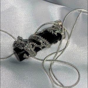Onyx and Silver dragon pendant in a silver chain